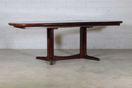 § A Danish rosewood dining table, Circa 1970