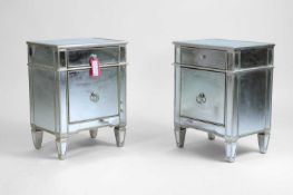 A pair of mirrored bedside cabinets Modern