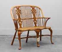 A yew and elm windsor chair back settle Of recent manufacture
