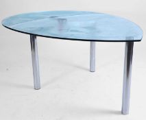 A chrome and glass table Modern