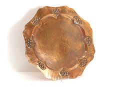 An Arts and Crafts copper charger Early 20th century