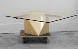 An Artedi travertine, brass, and glass coffee table Circa 1980, Italian
