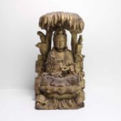 A Chinese lacquered wood carving of Guanyin Qing dynasty (1644-1911)