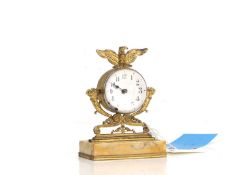 A gilt metal and glass timepiece 20th century, French