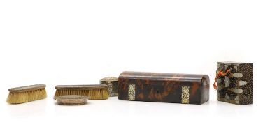 Two silver and tortoiseshell clothes brushes