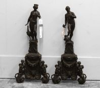A pair of bronzed firedogs 20th century