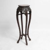 A Chinese carved hardwood jardinière stand Late 19th/early 20th century