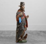 A carved and polychrome-painted wooden figure of St Roche 18th century, Northern European