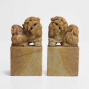 A pair of Chinese soapstone bookends, 20th century,