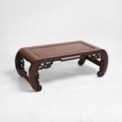 A Chinese carved hardwood low table Late 19th century