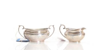 A silver sucrier and cream jug