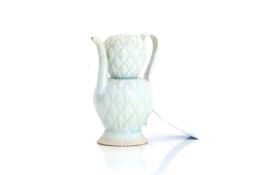A Chinese Qingbai ware ewer and cover