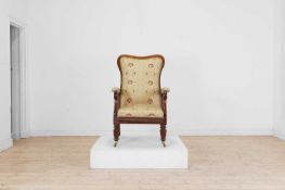 A George IV mahogany reclining library armchair Circa 1825