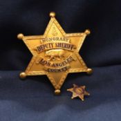 An Honorary Deputy Sheriff Los Angeles County gilt-metal badge