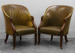 A pair of leather tub chairs Early 20th century