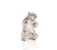 A silver novelty figure modelled as a bear