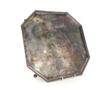 A silver square salver