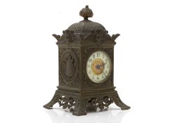 A cast metal mantle clock Late 19th century