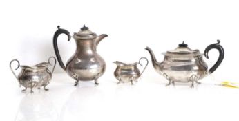 A silver four part tea service