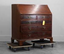 A George III mahogany bureau chest Third quarter 18th century