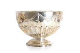 A large silver punch bowl