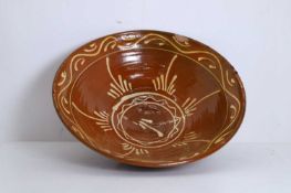 An earthenware slip ware bowl late 19th century