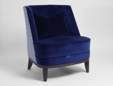 A contemporary blue velvet armchair Modern, by Wychwood Design