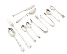 A collection of silver flatware