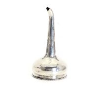 A silver wine funnel
