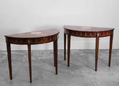 A pair of mahogany painted console tables 20th century