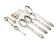 A collection of silver spoons