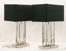 A pair of contemporary chrome and glass table lamps Of modern manufacture
