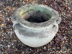 A reconstituted garden urn Of modern manufacture