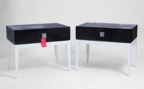A pair of contemporary bedside tables and a matching side table Modern