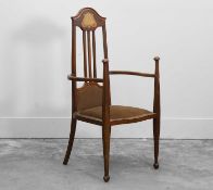 An inlaid mahogany armchair probably designed by JS Henry (1859-1928)
