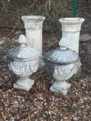 A pair of reconstituted garden urns and covers Of modern manufacture