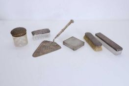 A collection of silver items,