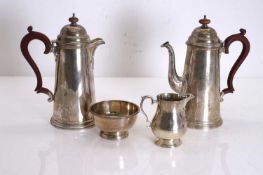 A silver four-piece coffee set,