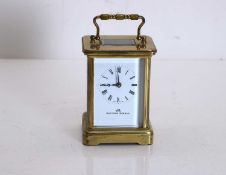 A modern brass carriage clock, by Matthew Norman,