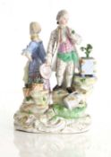 A Meissen figure group of a young couple in 18th century dress, 19th century,