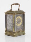 A brass and silver carriage clock, 19th century,