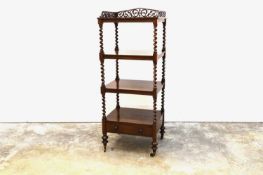 An early Victorian rosewood four-tier what not, circa 1840,