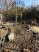 A wrought iron plant stand, 20th century,