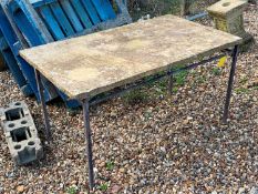 A stone and iron table, of recent manufacture,