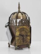 A brass lantern clock, in the 17th century style,