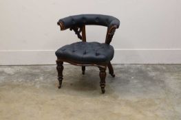 A Victorian walnut-framed library chair, circa 1850,