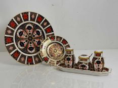 A Royal Crown Derby dinner service, Of recent manufacture,