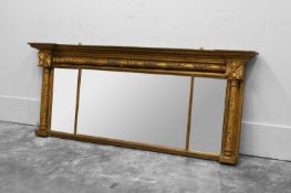 A Regency giltwood overmantel mirror, 19th century,