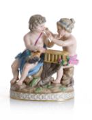 A Meissen putti group of putti with a bird cage, 19th century,