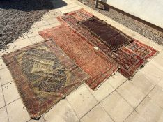 A group of five Persian rugs, 19th to 20th century,